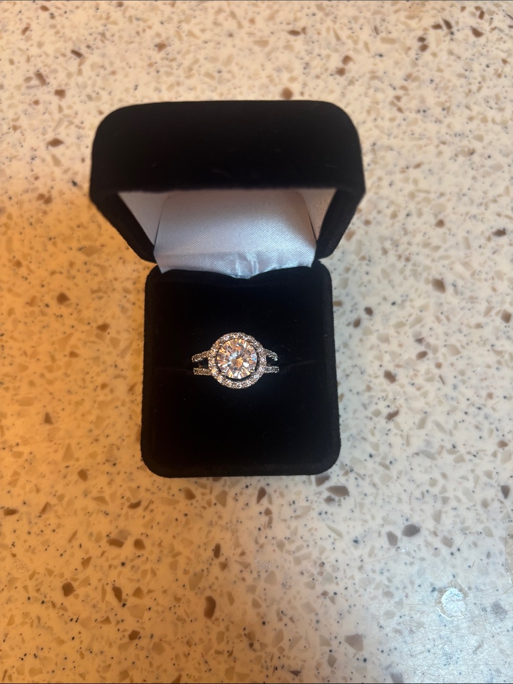 Sterling Silver Halo Engagement Ring with Diamonique stones.